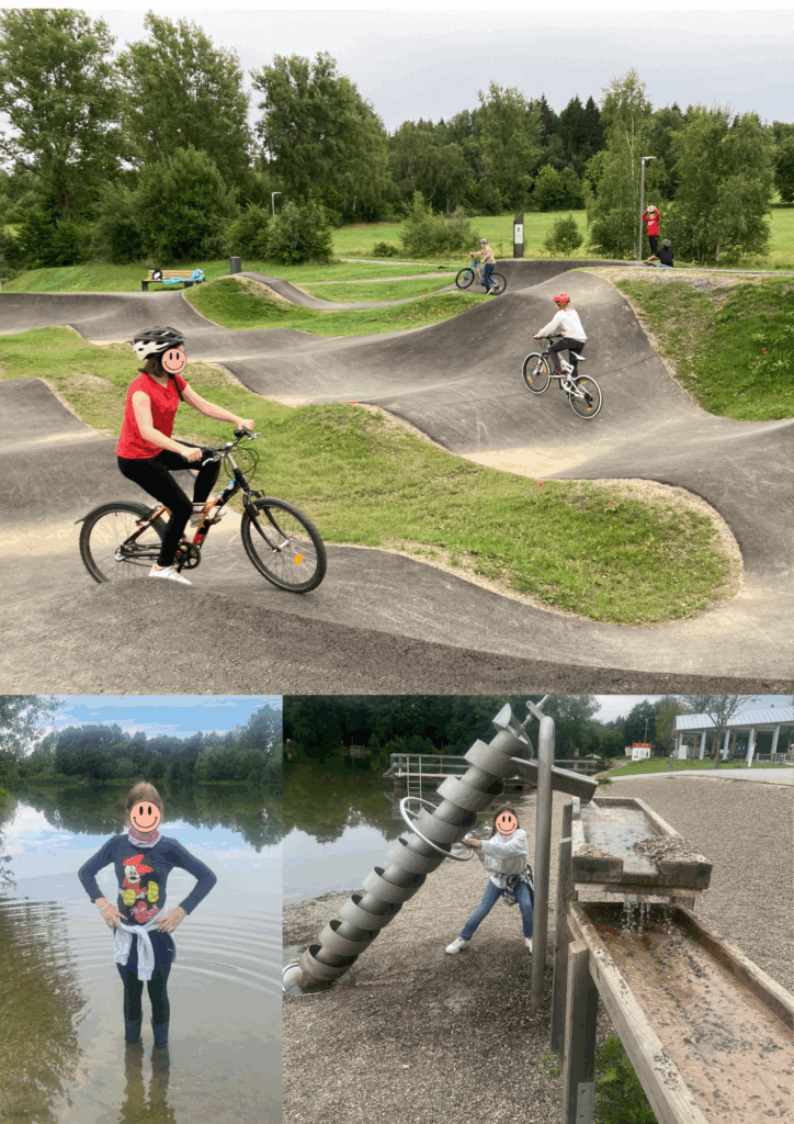 Kinder auf Fahrrädern oder Inlinern fahren über einen hügeligen Pump-Track Unterer Teil des Bildes: ein Mädchen steht mit Gummistiefeln im Wasser am See, ein anderes Mädchen spielt auf einem Wasserspielplatz am See